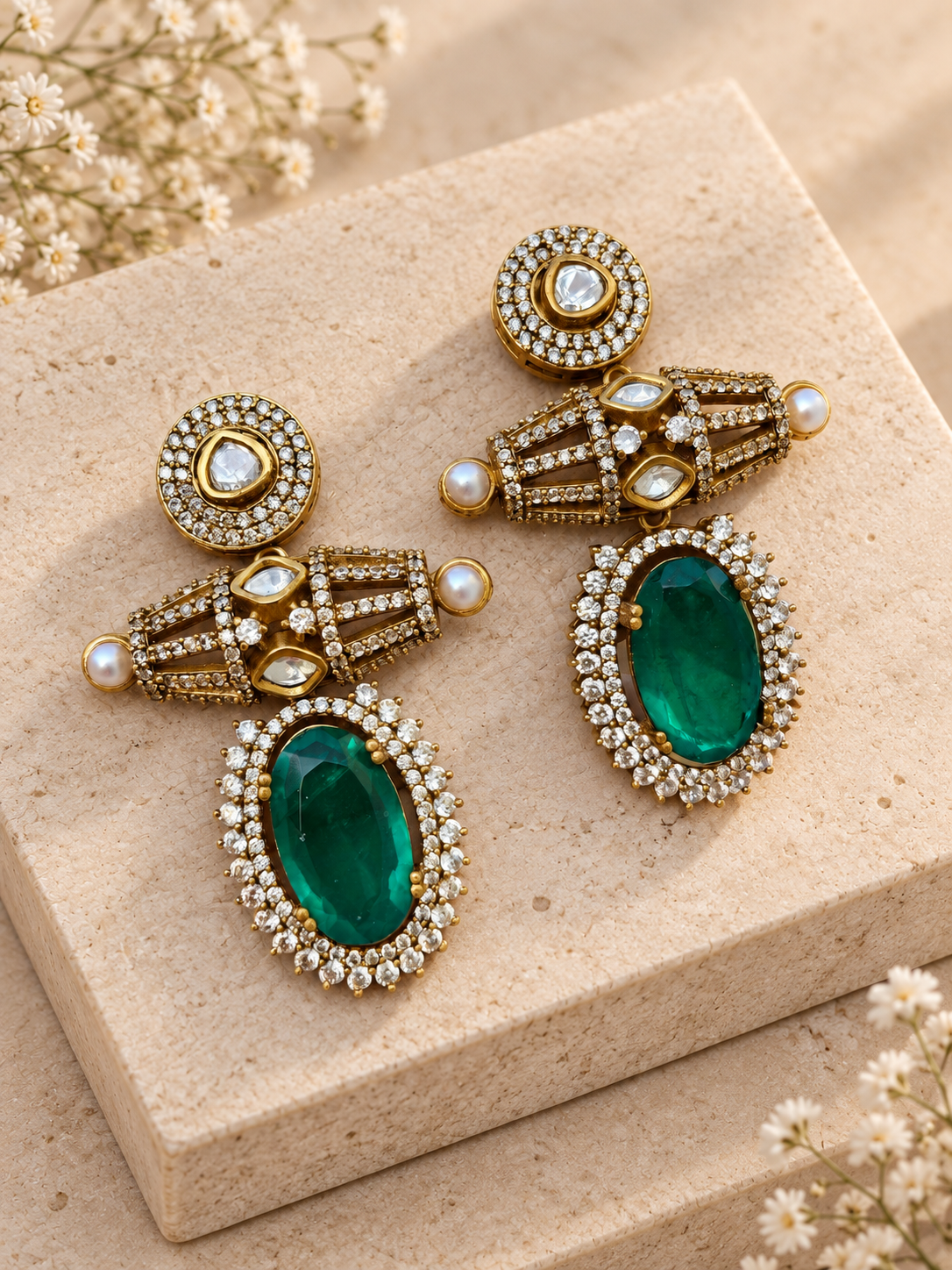 Moissanite Polki Kundan with Doublet Stone Earrings, Green colour, on beige square stone with small white flowers.
