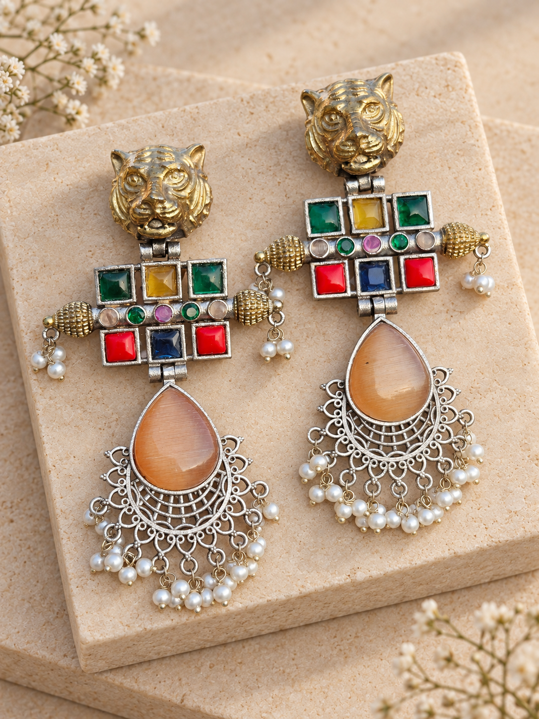 Dual-Tone Tiger Head Monalisa Stone Earrings, Peach Orange colour, on beige square stone with small white flowers.