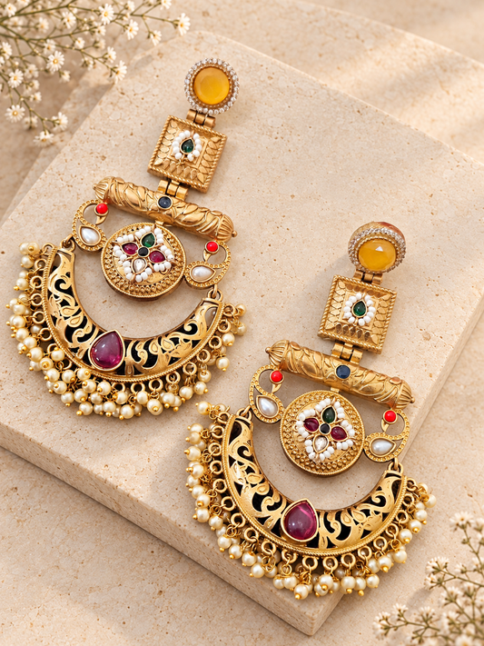 Apala Polish Chandbali Earrings, Multicolor colour, on beige square stone with small white flowers.