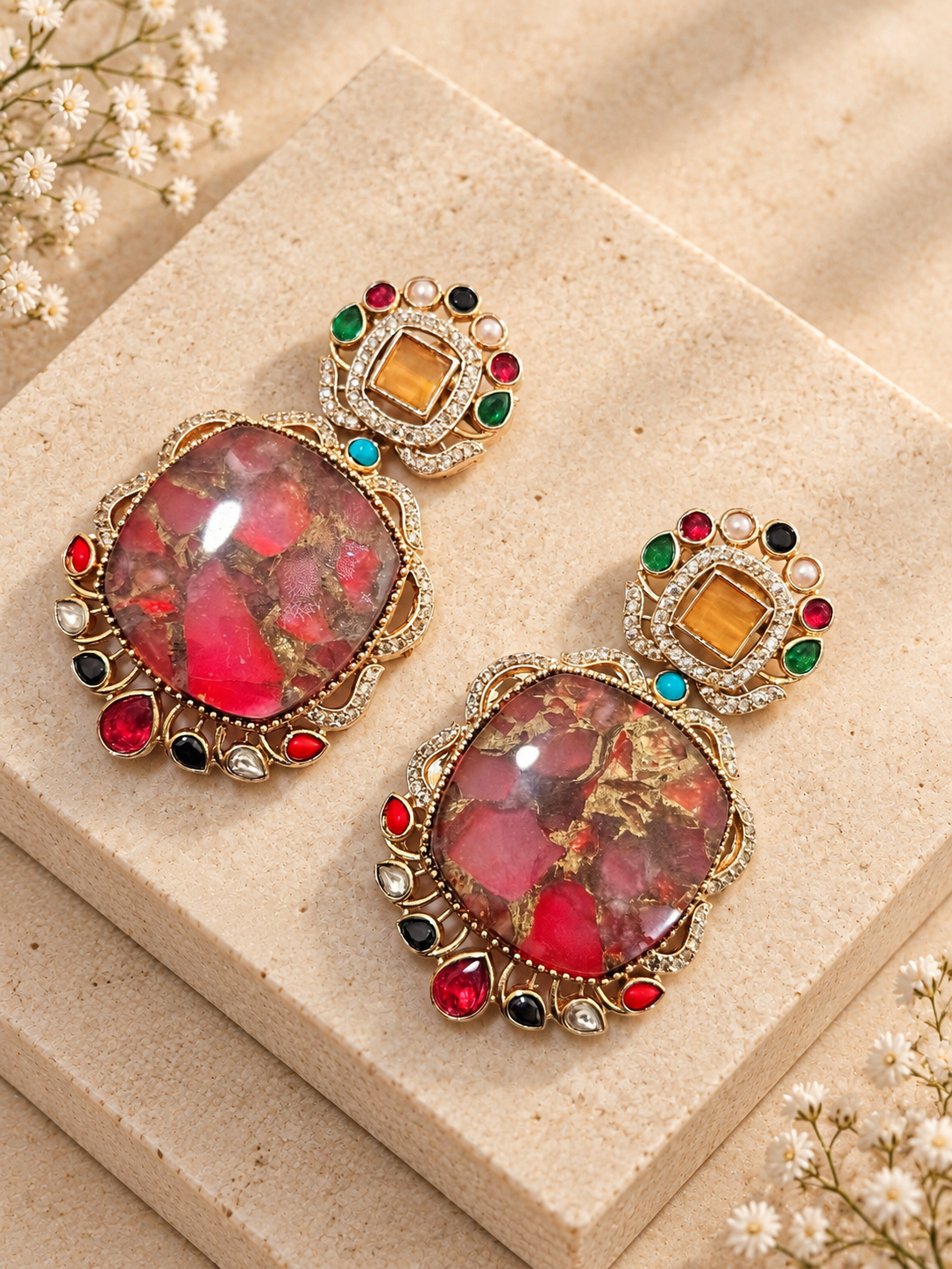 Avni Doublet Earrings with Moissanite Polki AD Stone, Pink colour, on beige square stone with small white flowers.