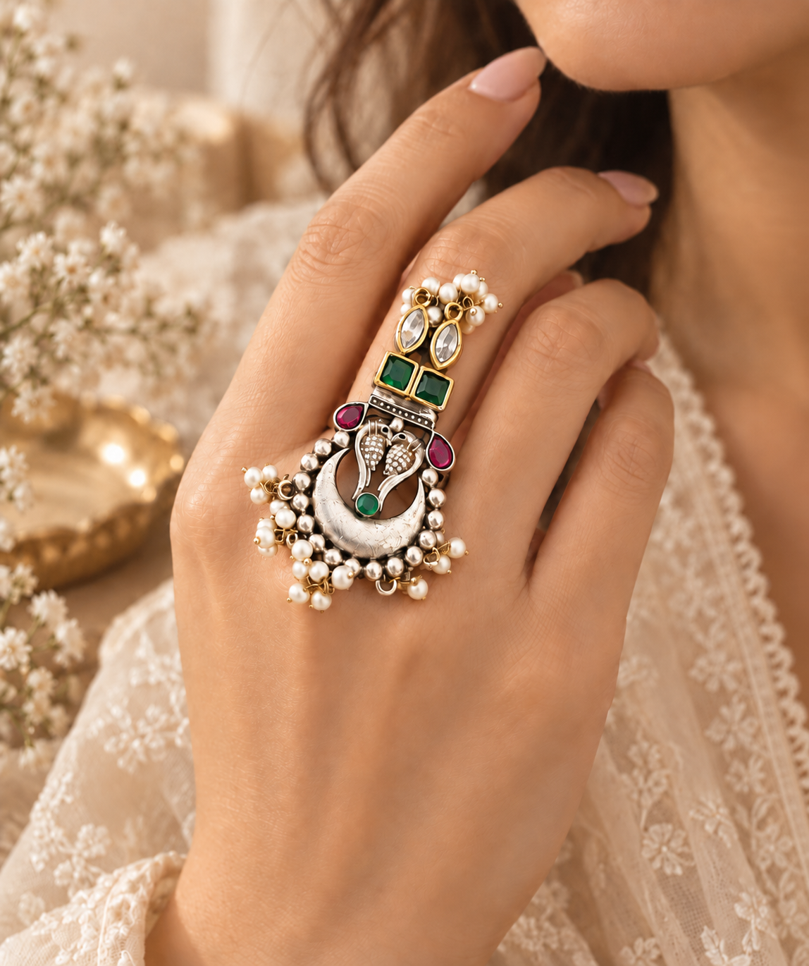 Dual tone peacock silver lookalike brass statement ring worn on hand