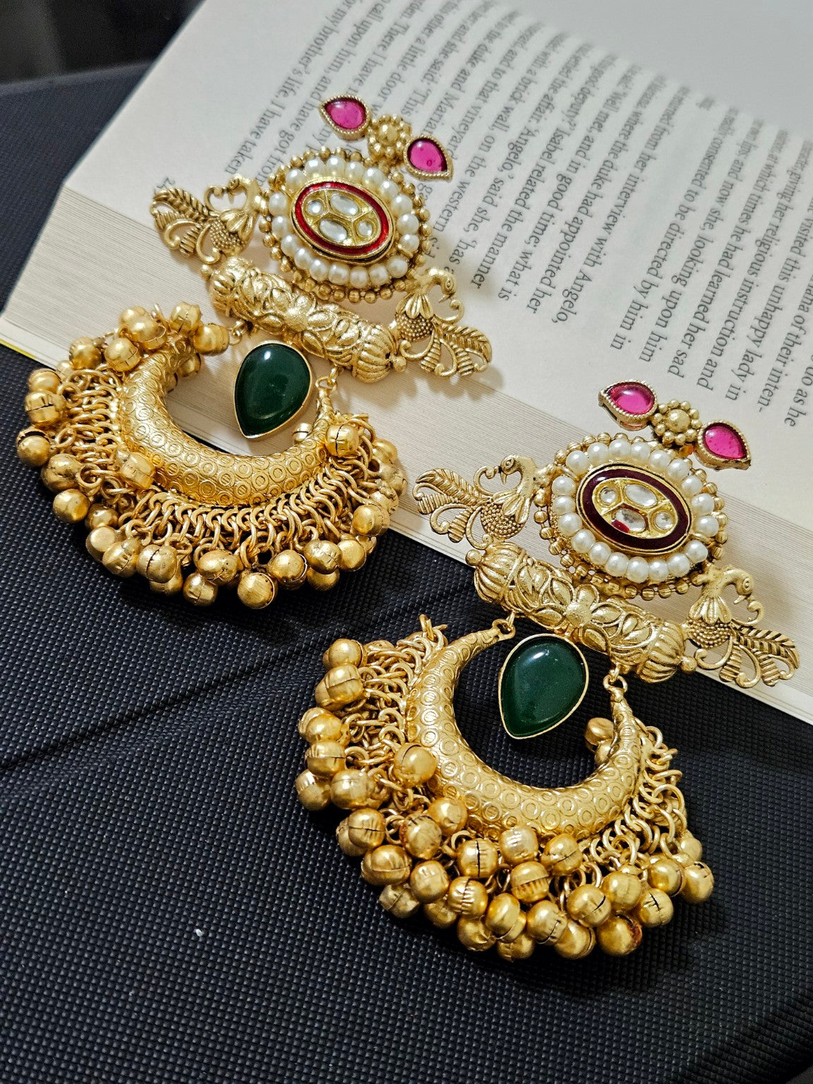 Green Mona Lisa stone gold plated Chandbali earrings in natural daylight