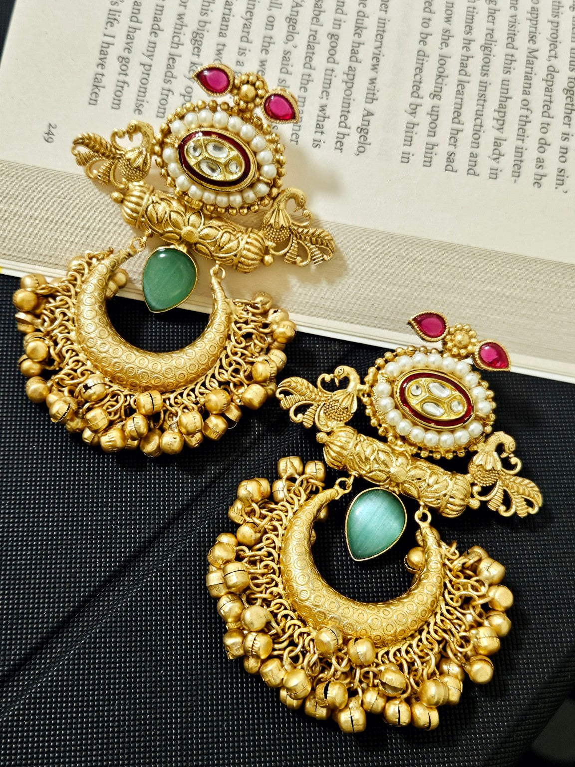 Mint Mona Lisa stone gold plated Chandbali earrings in natural daylight