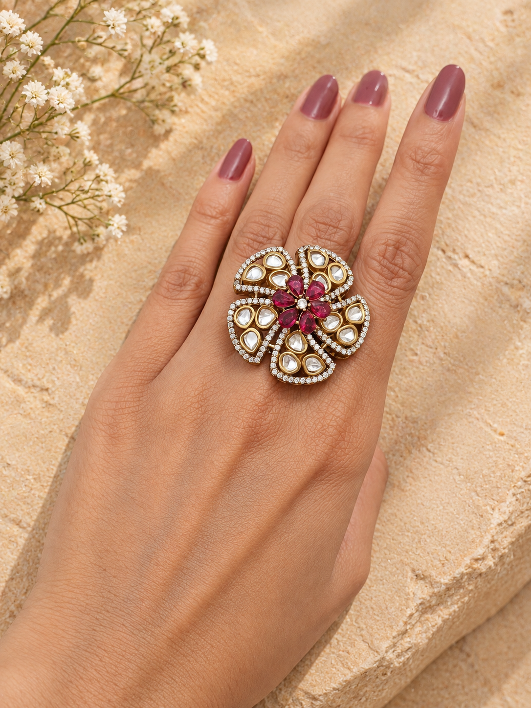 Aara floral Kundan Polki statement ring worn on hand
