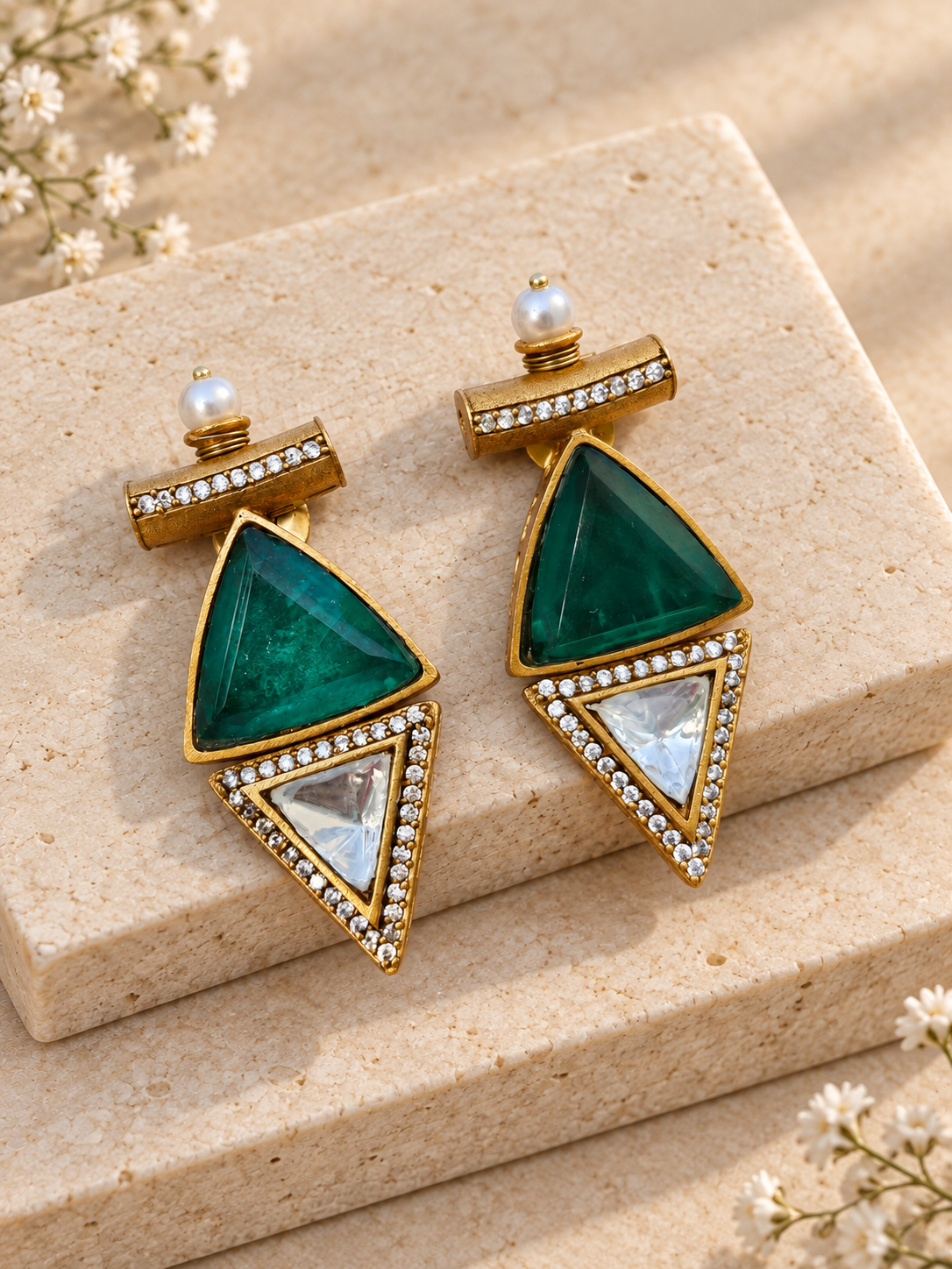 Moissanite Polki Kundan with Doublet Stone Triangular Earrings, Green colour, on beige square stone with small white flowers.