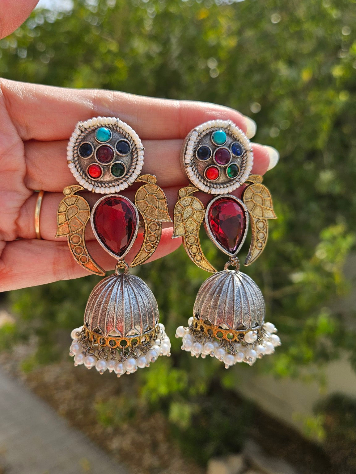 Multicolor dual tone statement jhumka earrings in natural daylight