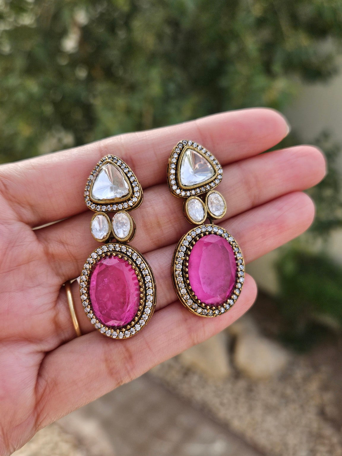 Pink Moissanite Polki Kundan doublet stone earrings photographed in natural daylight