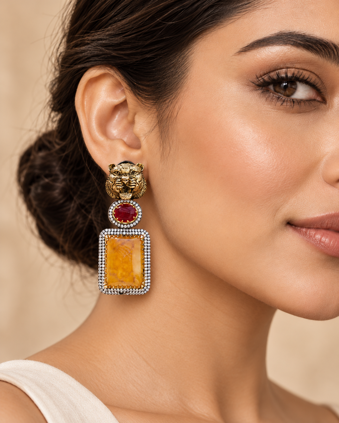 Modern model wearing Sabya-inspired tiger head fusion statement earrings