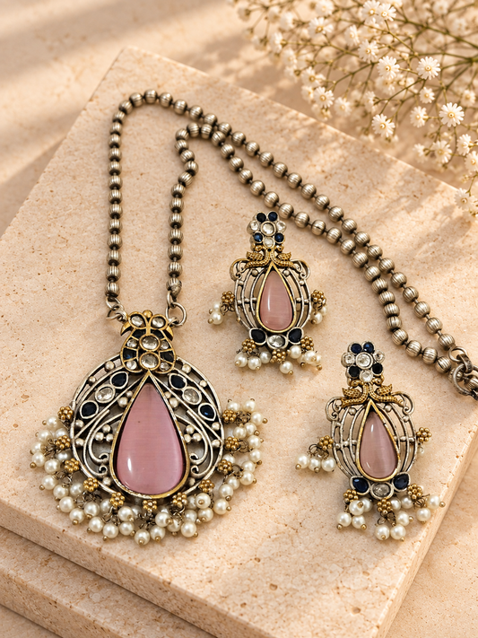 Silver Replica Dual Tone Monalisa Stone Chain Pendant Set, Pink colour, on beige square stone with small white flowers.