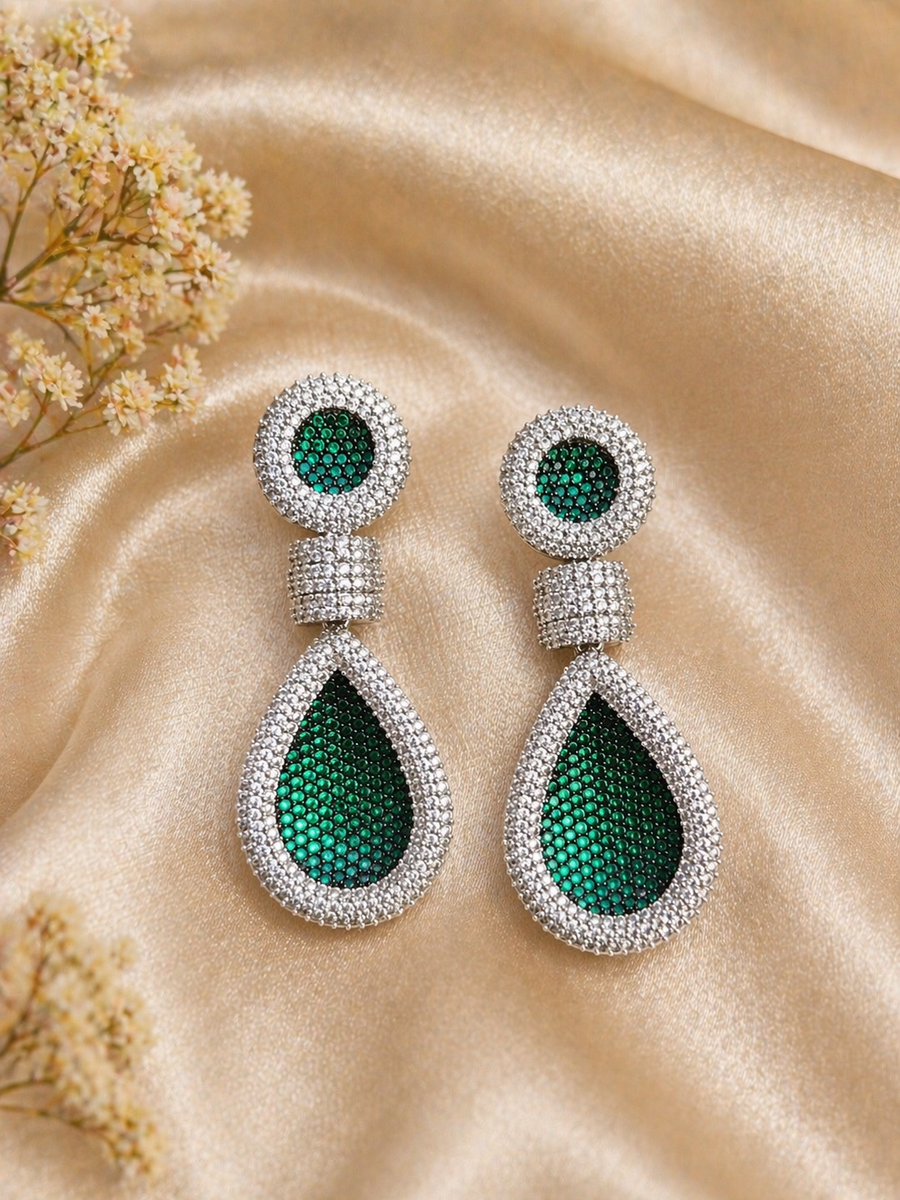CZ stone drop earrings with green stones and rhodium plating, partywear and cocktail jewelry
