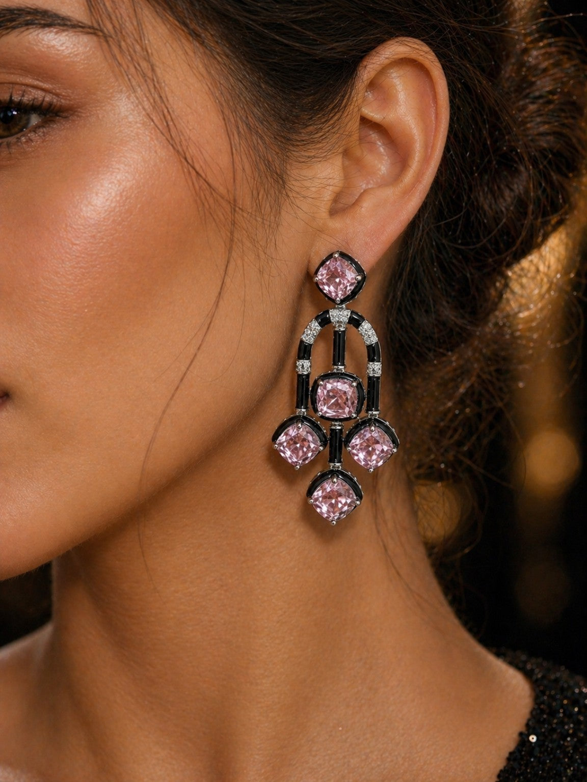 Model wearing pink premium cut stone enamel statement earrings